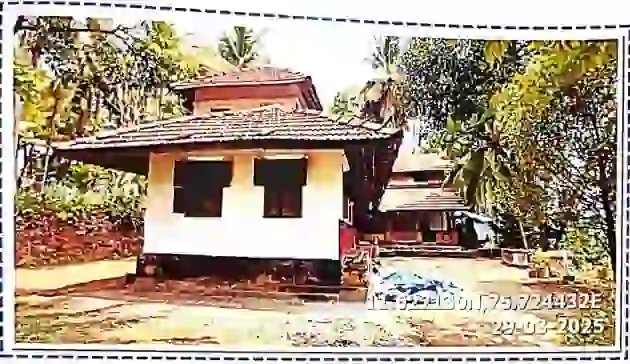 Residential Building situated in 375 Cents of Land (1.5176 Hectors) in Sy No. 24/21 and Re Sy No 24/21 (Thadapper No - 5722) in Koorchakam Desom, Velom Village, Vadakara Taluk, Kozhikode District with boundaries: East: Tar Road, West : Mud Road, South : Panchayath Road, North: Property in Possession of Hameed and Moidu and Lane