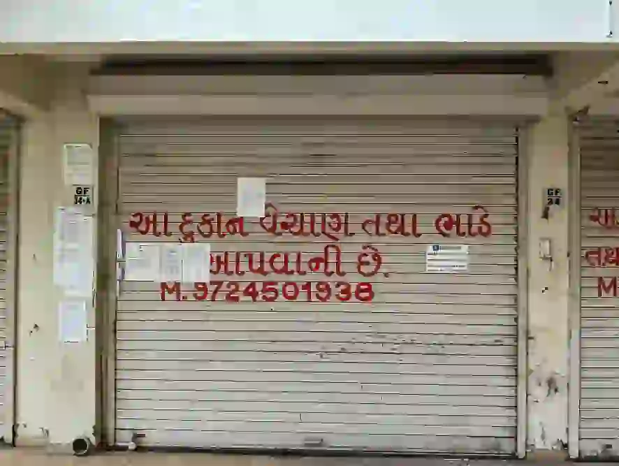 Commercial Shop No. 34A situated at Ground Floor, with carpet area of 285 Sq. ft. in the scheme titled as "Vraj Vihar", located in Vadodara Kasba, Babajipura, Near Kirti Stambh, Vadodara.