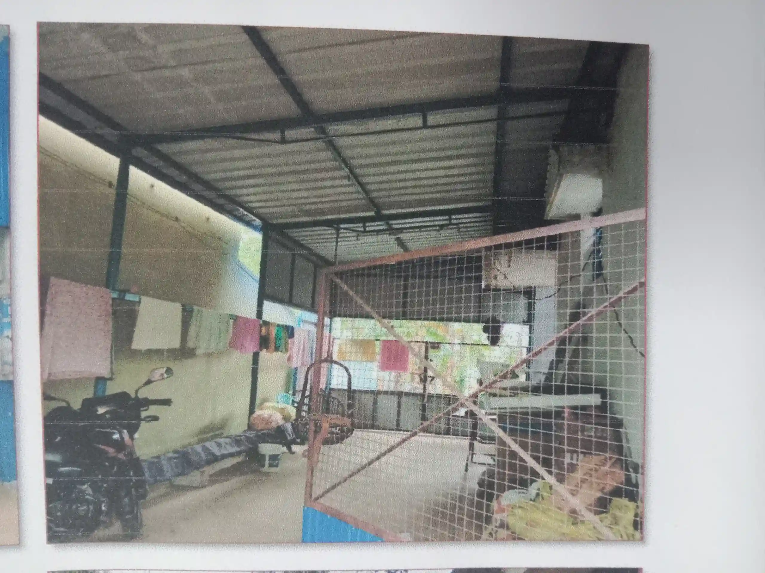 A.C.C roofed house located in Kurichi village, Bhavani Taluk, Erode. Situated between Nallasamy's and P Ganesan's properties, with specific dimensions: 71 ¼ feet East-West and 14 ¼ feet North-South on eastern side.